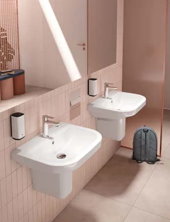 Semi-pedestal washbasin with a backpack hanging beside it