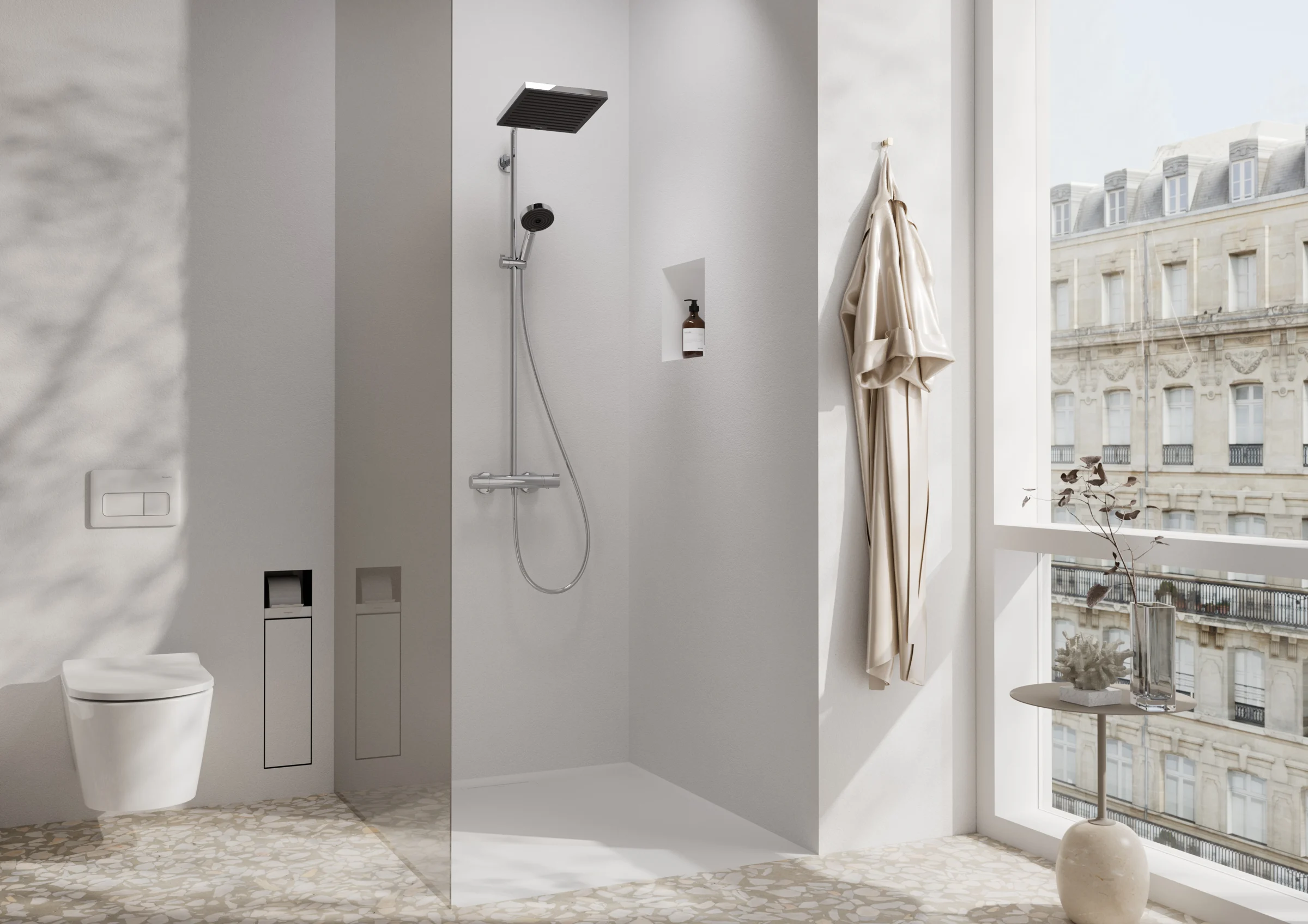 Bright shower bathroom with a black overhead shower and a city window