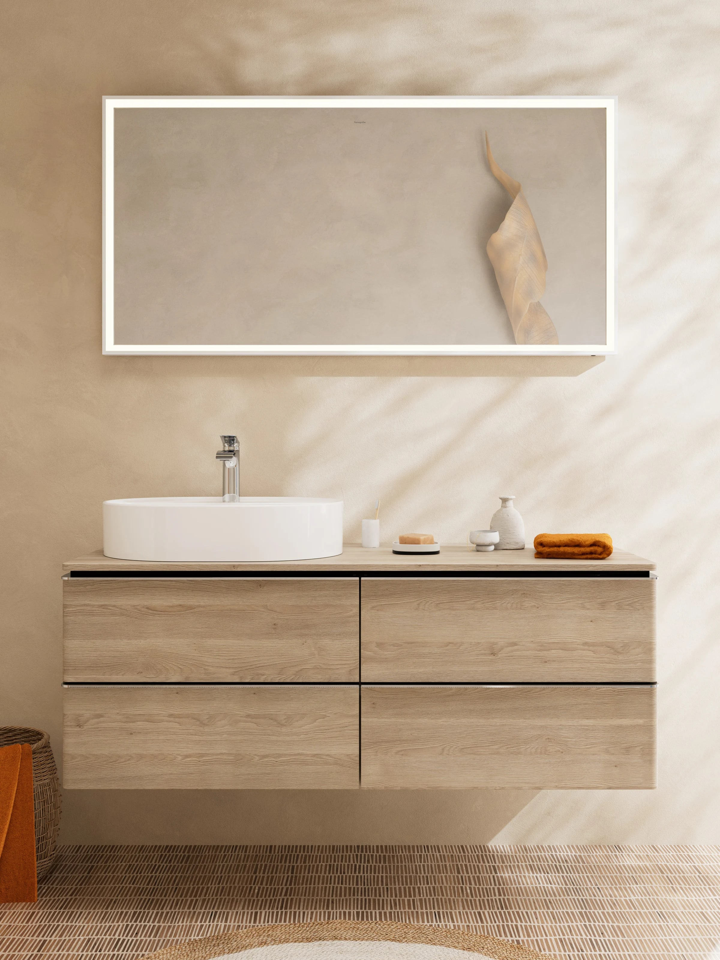 Light oak vanity with a white basin in front of a sunny window