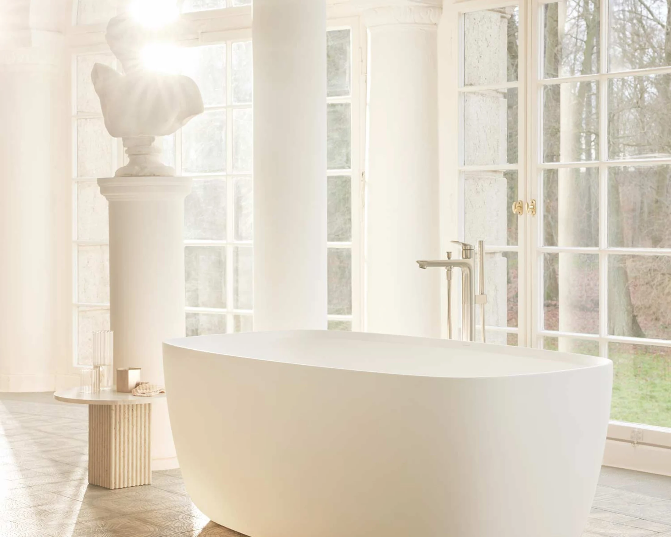 Aurena bathroom with a freestanding bath and marble
