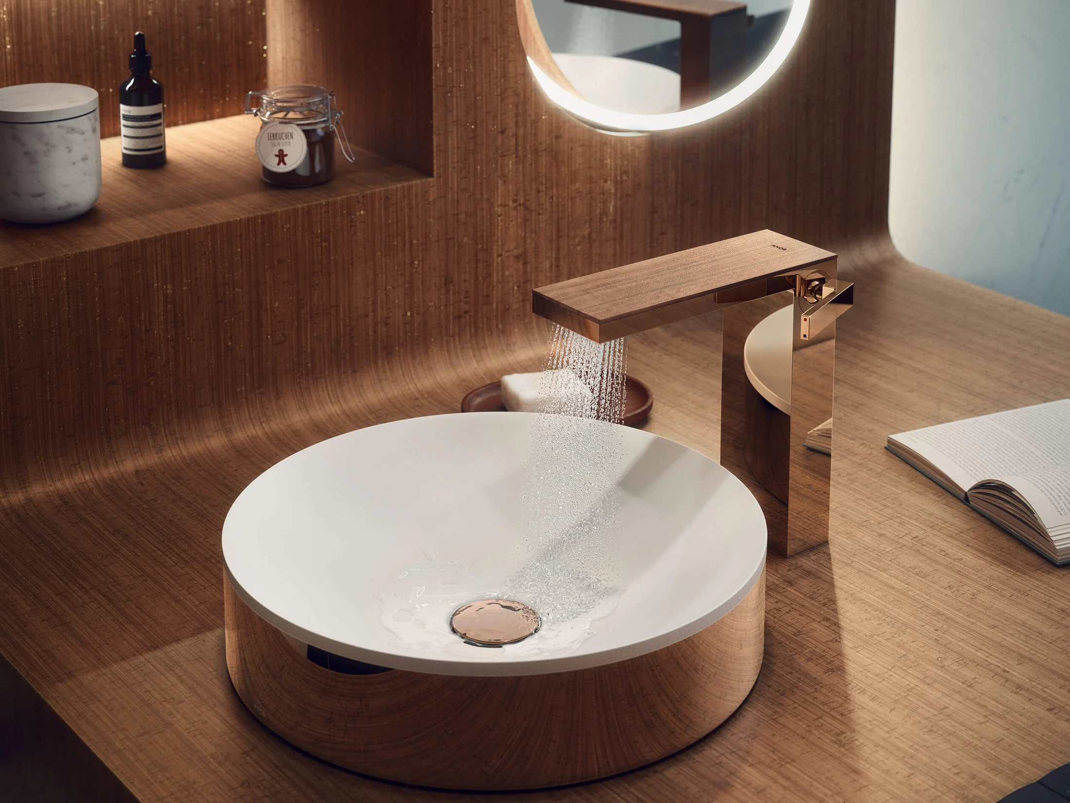 Mixer with wood and copper finish above a round white countertop basin
