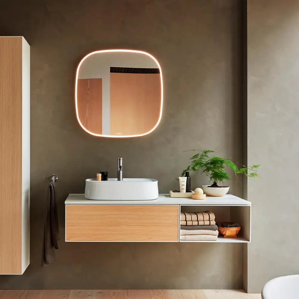 Zencha washplace in warm oak with a soft bowl and a lit rounded mirror