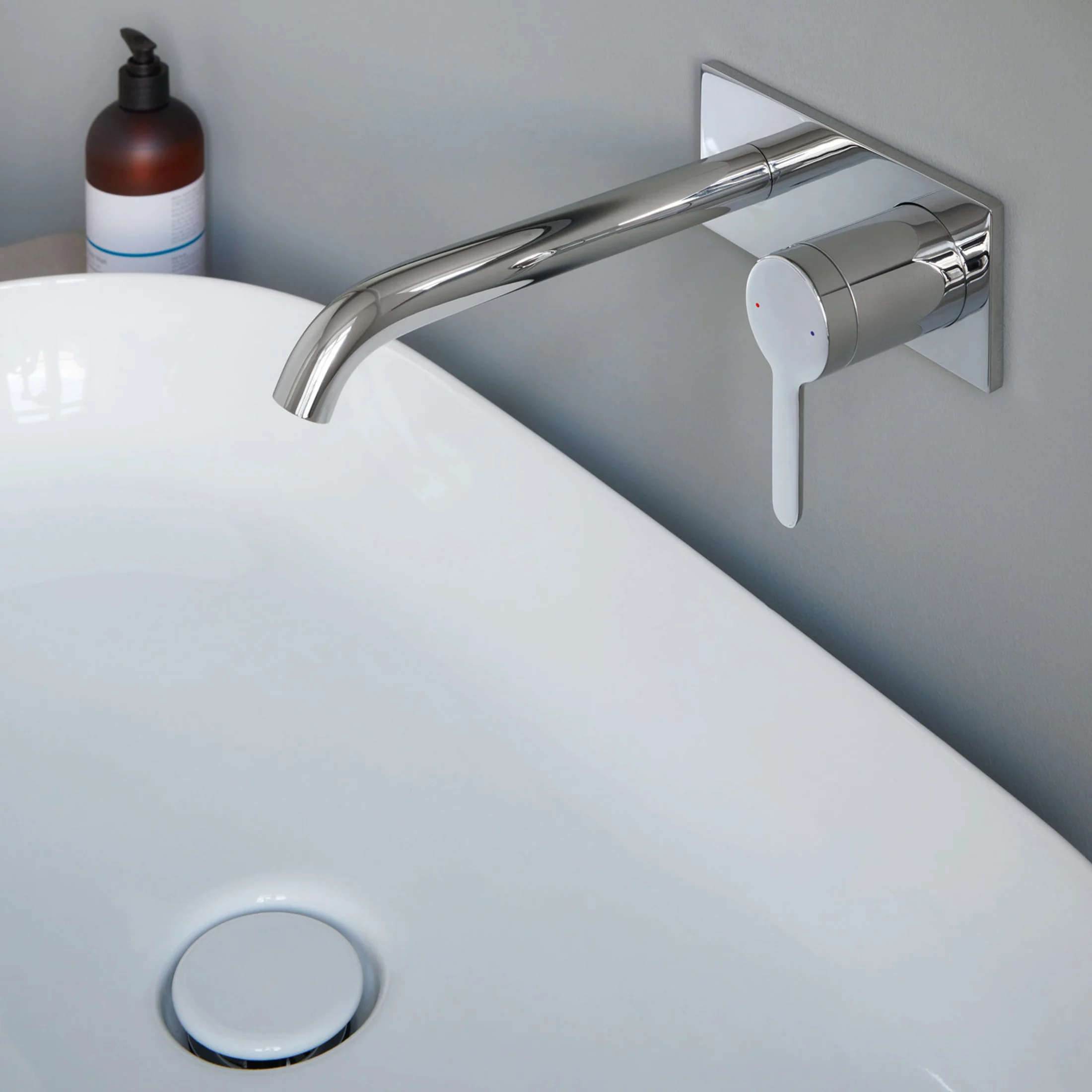 Oval basin on a natural-stone console