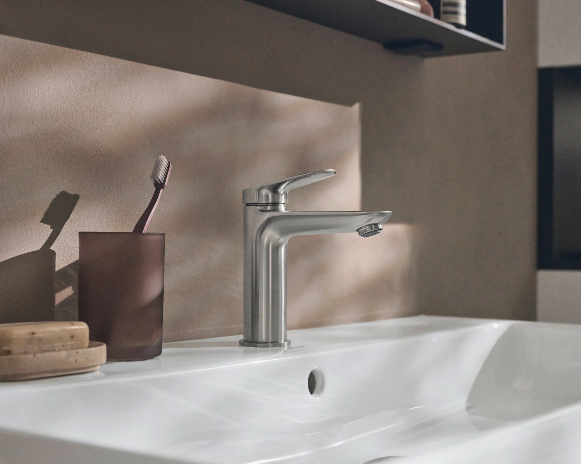 Qatego washplace with a brushed mixer in warm side light